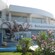 Exterior of the Thalassocosmos Aquarium featuring a larger than life octopus adornment above the entrance